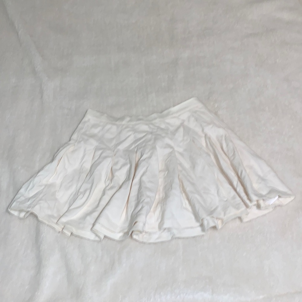 Cream colored short skirt